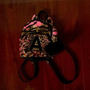 it’s a good size and it’s pretty cute it has cat ears